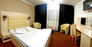 Отель MBI Travel Inn Крайова Номер Делюкс с кроватью размера «queen-size»-1